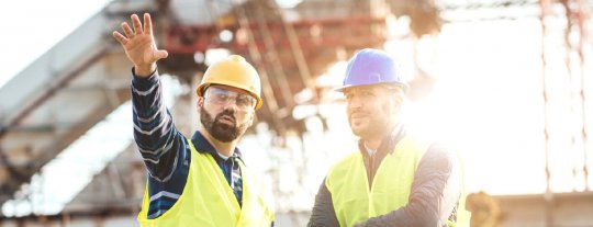 Men in highvis and hardhats