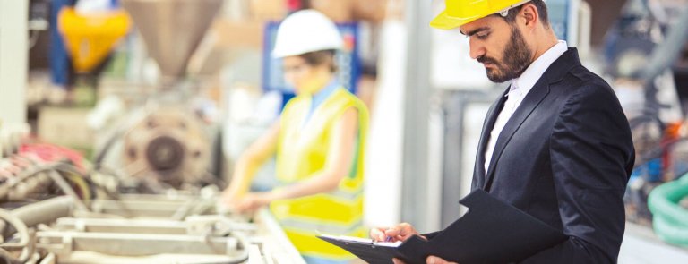 Man in suit and hardhat