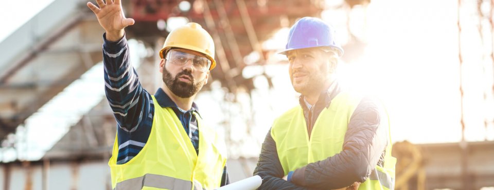 Construction workers planning