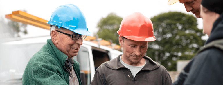 Construction workers adhering to CDM guidelines