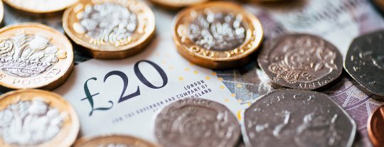 Picture of pound coins, 20 pound notes and change
