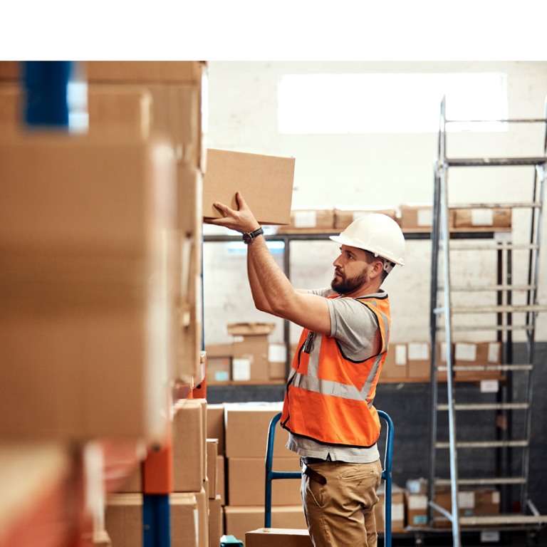 Employee practicing safe manual handling