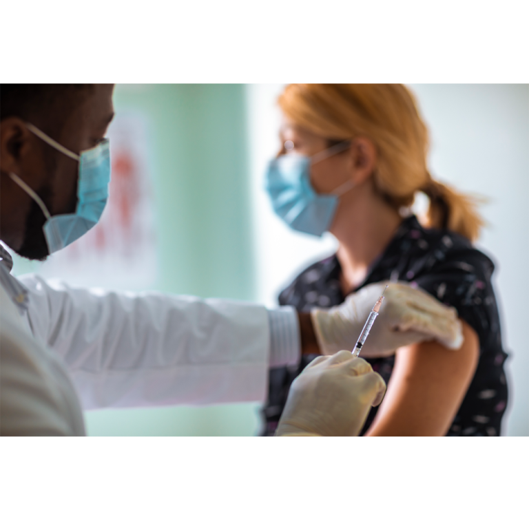 Covid vaccine being delivered to a care worker