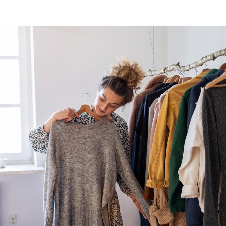 Woman looking into outfits for work